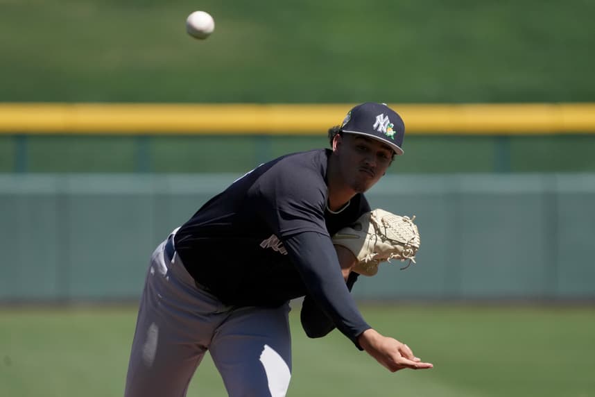Carlos Lagrange throws for the Yankees during spring training