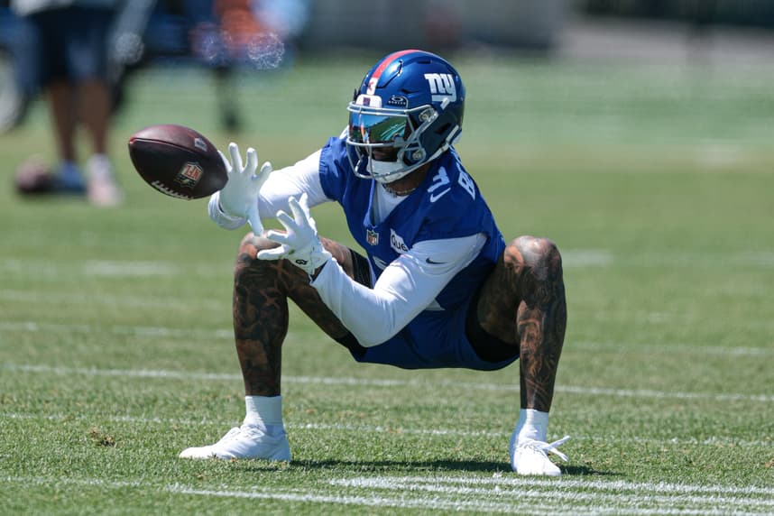 Odell Beckham Jr. reaches for a catch during an NFL game