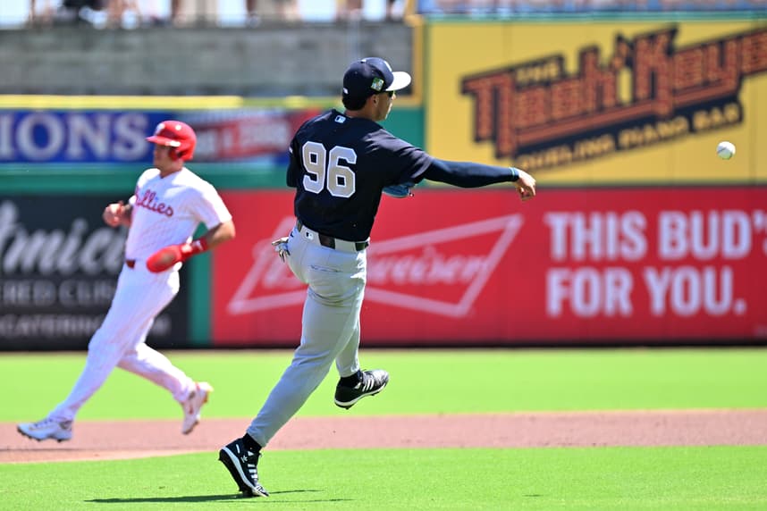 George Lombard Jr. throws to first during Yankees spring training