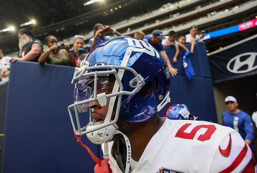 Aug 17, 2024; Houston, Texas, USA;  New York Giants wide receiver Allen Robinson II (5) and teammates run onto the field before playing against the Houston Texans at NRG Stadium. Mandatory Credit: Thomas Shea-Imagn Images