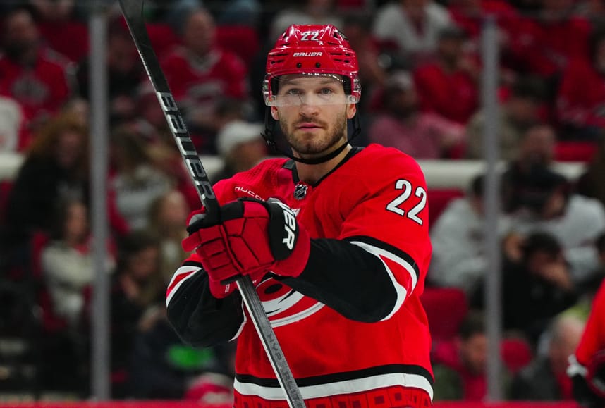 Mar 28, 2024; Raleigh, North Carolina, USA;  Carolina Hurricanes defenseman Brett Pesce (22) looks on against the Detroit Red Wings during the second period at PNC Arena. Mandatory Credit: James Guillory-USA TODAY Sports
