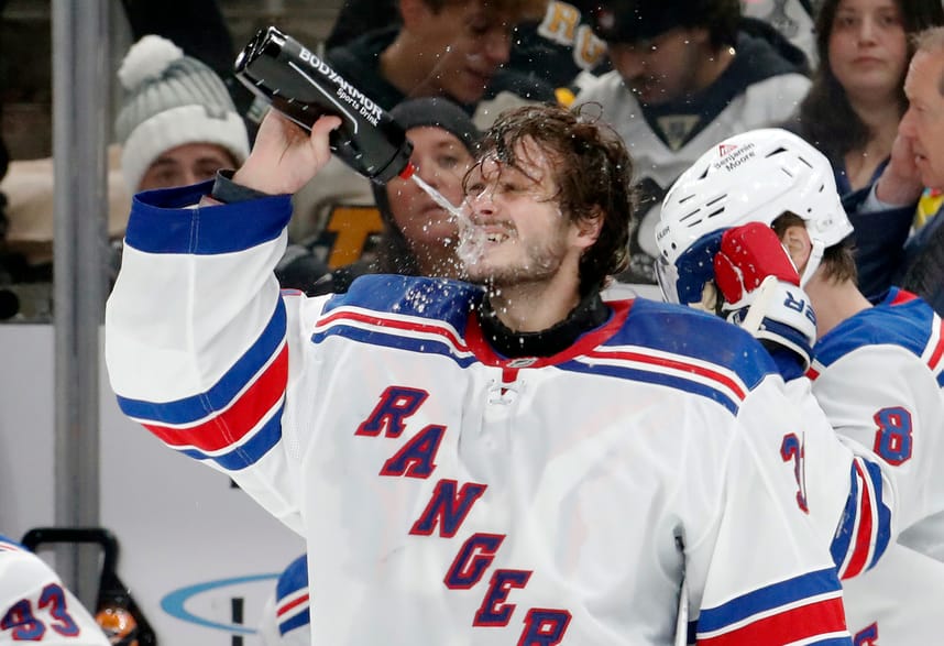 Oct 9, 2024; Pittsburgh, Pennsylvania, USA; New York Rangers goaltender Igor Shesterkin (31) squirts water on his face during a time-out against the Pittsburgh Penguins in the third period at PPG Paints Arena. Mandatory Credit: Charles LeClaire-Imagn Images