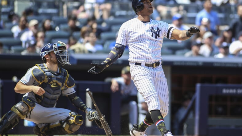 New York Yankees outfielder Aaron Hicks hits a home-run against the Tampa Bay Rays.