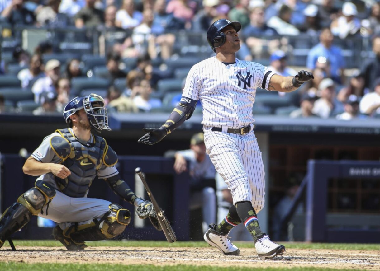 New York Yankees outfielder Aaron Hicks hits a home-run against the Tampa Bay Rays.