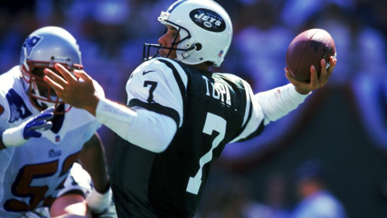 tom tupa throwing a pass in a recent game against the patriots