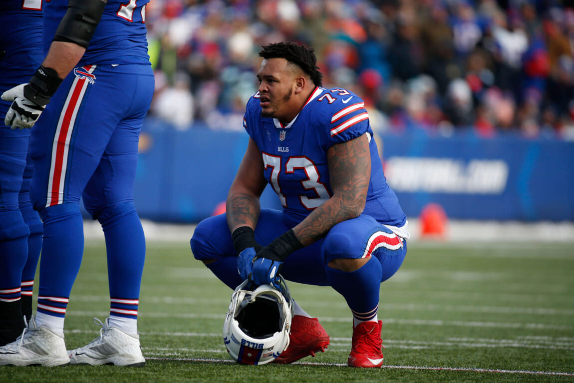 Buffalo Bills offensive tackle Dion Dawkins (73) warms up before