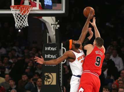 Knicks, Mitchell Robinson Chicago Bulls center Nikola Vucevic (9) shoots against New York Knicks center Mitchell Robinson (23) during the first half at Madison Square Garden