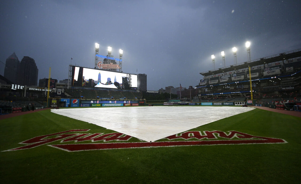 VIDEO: Cleveland Indians enjoy rain delay with slip-and-slide on infield  tarp