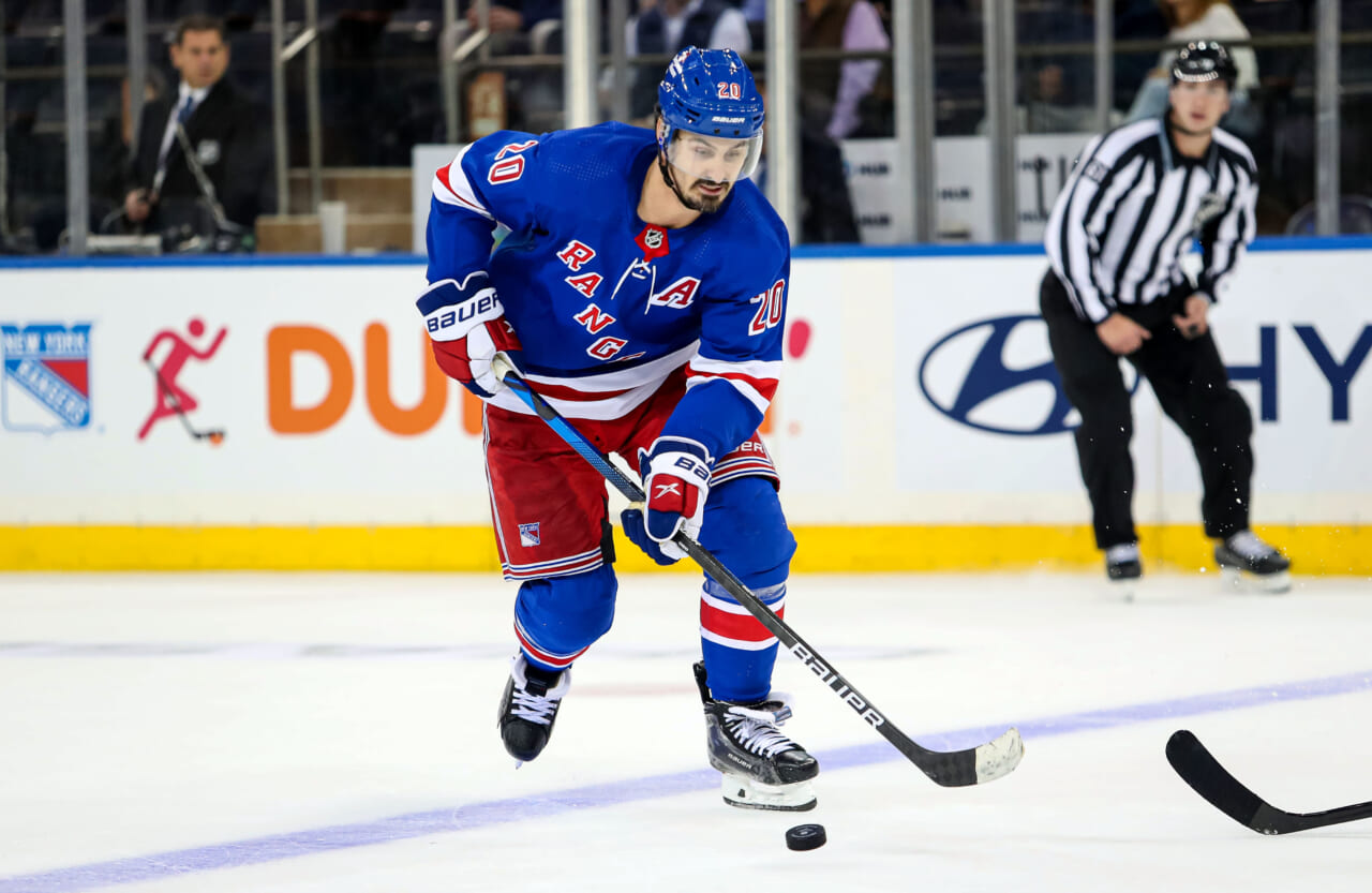 New York Rangers left wing Chris Kreider (20) skates with the puck against the San Jose Sharks during the third period at Madison Square Garden