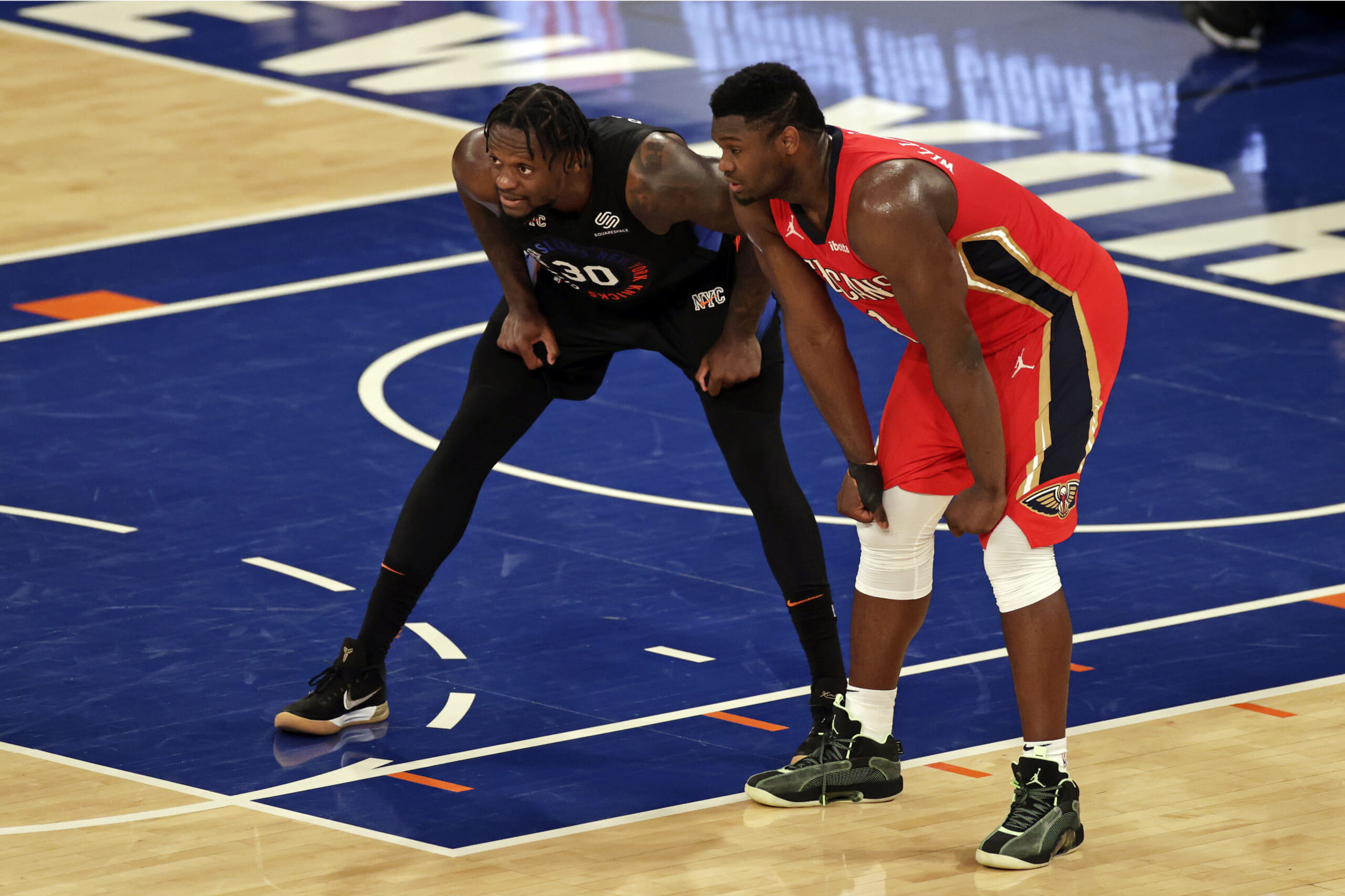 New York Knicks forward Julius Randle (30) and New Orleans Pelicans forward Zion Williamson (1) react during a break in game action during the second half against the New Orleans Pelicans at Madison Square Garden