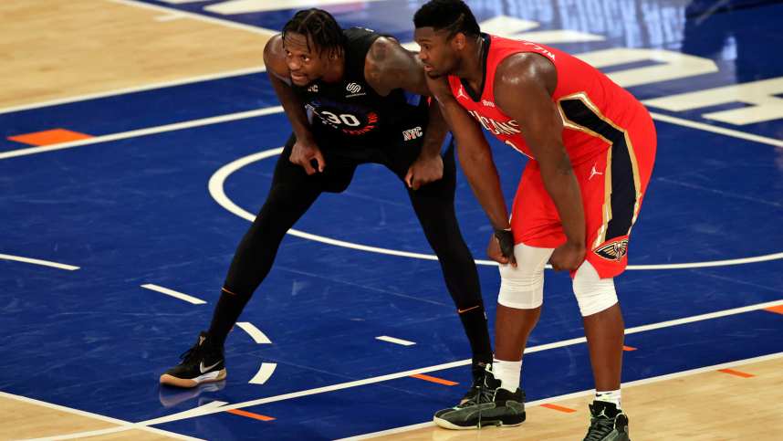New York Knicks forward Julius Randle (30) and New Orleans Pelicans forward Zion Williamson (1) react during a break in game action during the second half against the New Orleans Pelicans at Madison Square Garden