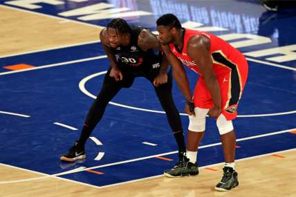 New York Knicks forward Julius Randle (30) and New Orleans Pelicans forward Zion Williamson (1) react during a break in game action during the second half against the New Orleans Pelicans at Madison Square Garden