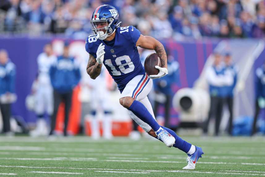 New York Giants wide receiver Isaiah Hodgins (18) gains yards after the catch during the first half against the Indianapolis Colts at MetLife Stadium