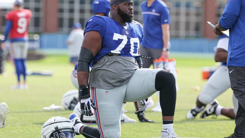 New York Giants offensive tackle Korey Cunningham (70) stretches during training camp at the Quest Diagnostics Training Facility