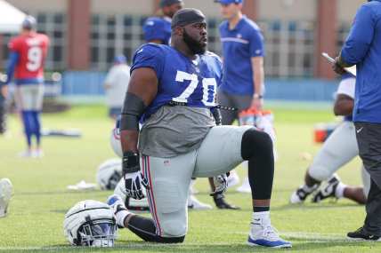 New York Giants offensive tackle Korey Cunningham (70) stretches during training camp at the Quest Diagnostics Training Facility
