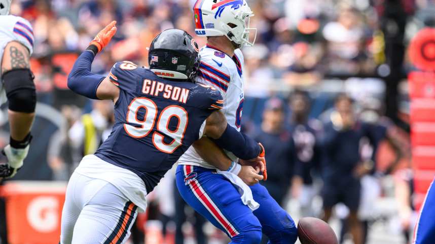 Chicago Bears defensive end Trevis Gipson (99) strips the ball from Buffalo Bills quarterback Kyle Allen (9) during the second quarter at Soldier Field (New York Giants)