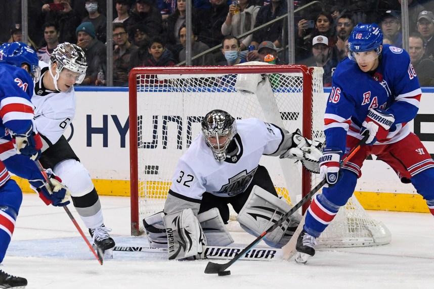 New York Rangers center Ryan Strome (16) plays with the puck in front of Los Angeles Kings goaltender Jonathan Quick (32) during the third period at Madison Square Garden