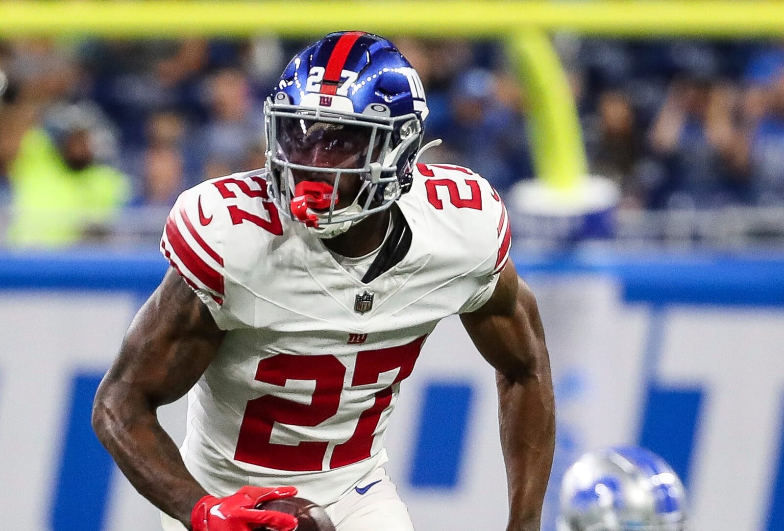 New York Giants safety Jason Pinnock (27) intercepts a pass from Detroit Lions quarterback Nate Sudfeld (10) during the first half of a preseason game in Detroit on Friday, Aug. 11, 2023.