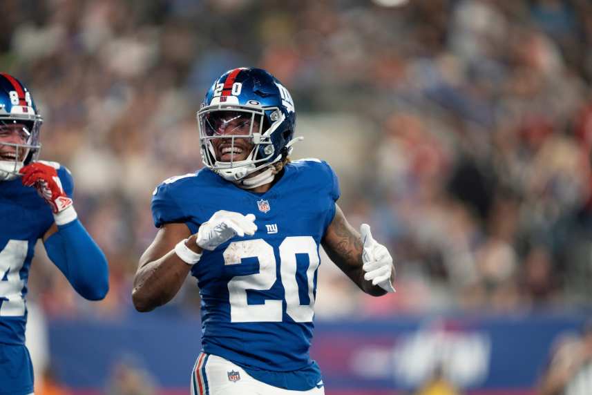 New York Giants Eric Gray (20) celebrates after scoring touchdown in the second quarter