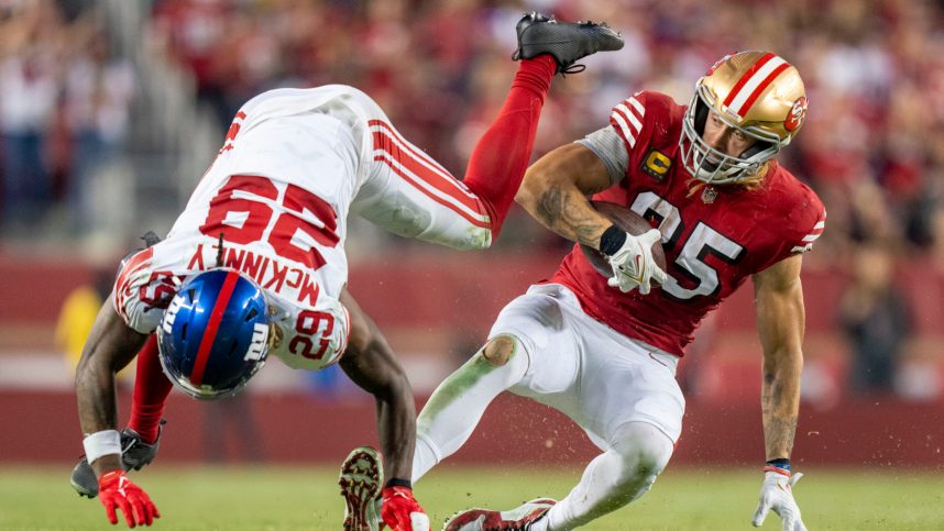 San Francisco 49ers tight end George Kittle (85) is tackled by New York Giants safety Xavier McKinney (29) during the third quarter at Levi's Stadium