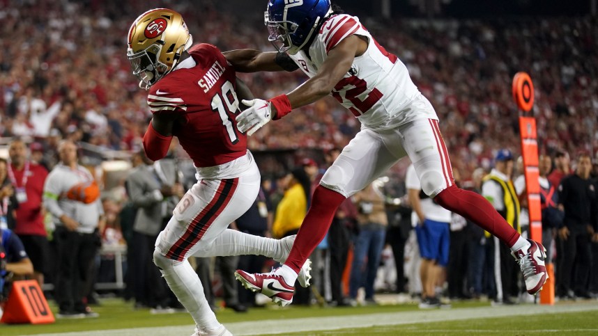 San Francisco 49ers wide receiver Deebo Samuel (19) catches a touchdown pass in front of New York Giants cornerback Adoree' Jackson (22) in the fourth quarter at Levi's Stadium.