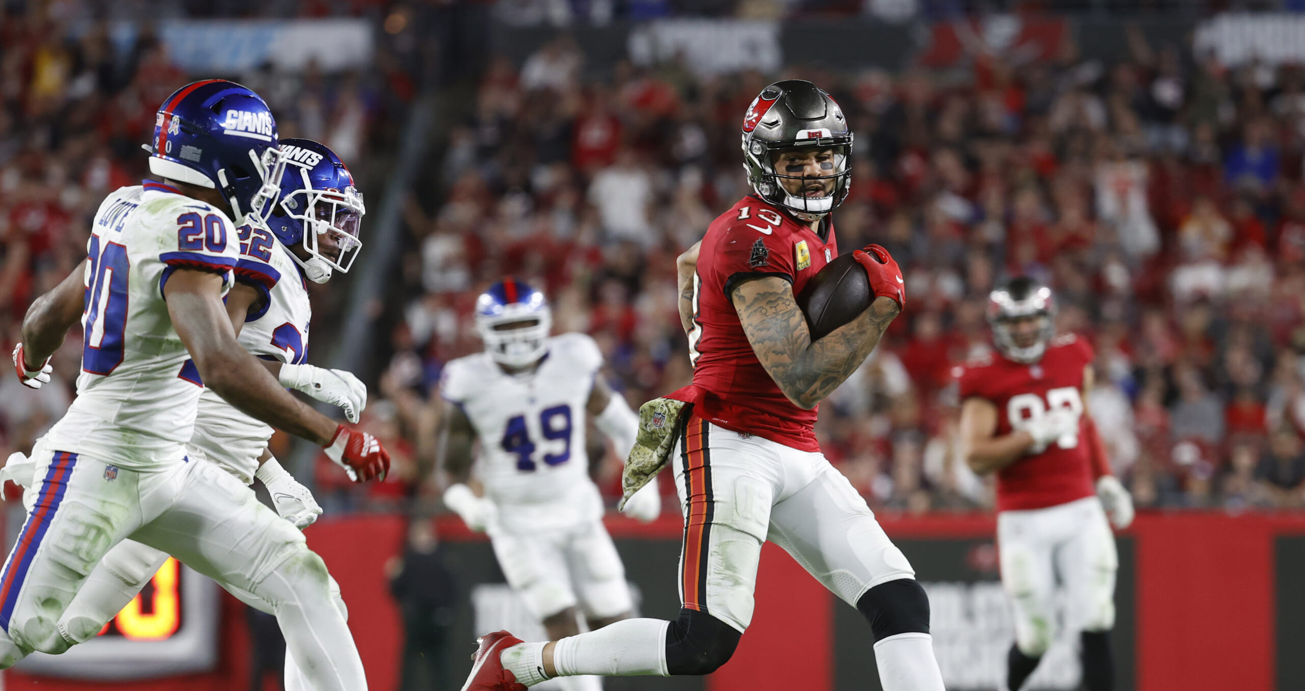 Tampa Bay Buccaneers wide receiver Mike Evans (13) runs with the ball against the New York Giants during the second half at Raymond James Stadium