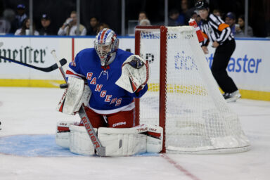 New York, New York, USA; New York Rangers goaltender Dylan Garand (98) makes a save against the New York Islanders during the third period at Madison Square Garden