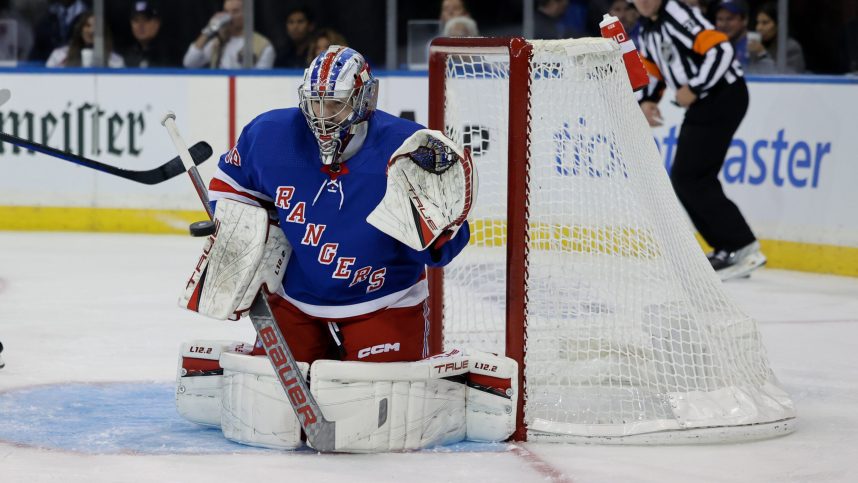 New York, New York, USA; New York Rangers goaltender Dylan Garand (98) makes a save against the New York Islanders during the third period at Madison Square Garden