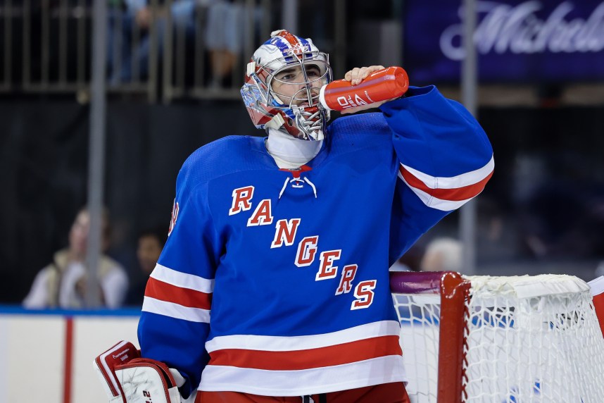 New York Rangers goaltender Dylan Garand (98) drinks water during a game against the New York Islanders at Madison Square Garden