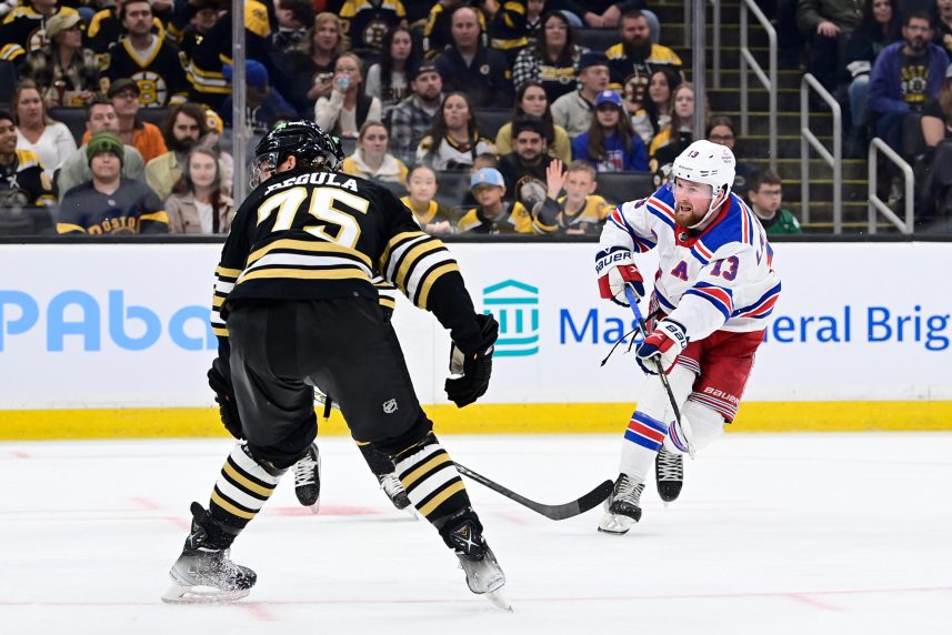 New York Rangers left wing Alexis Lafreniere (13) shoots the puck against the Boston Bruins during the second period at TD Garden