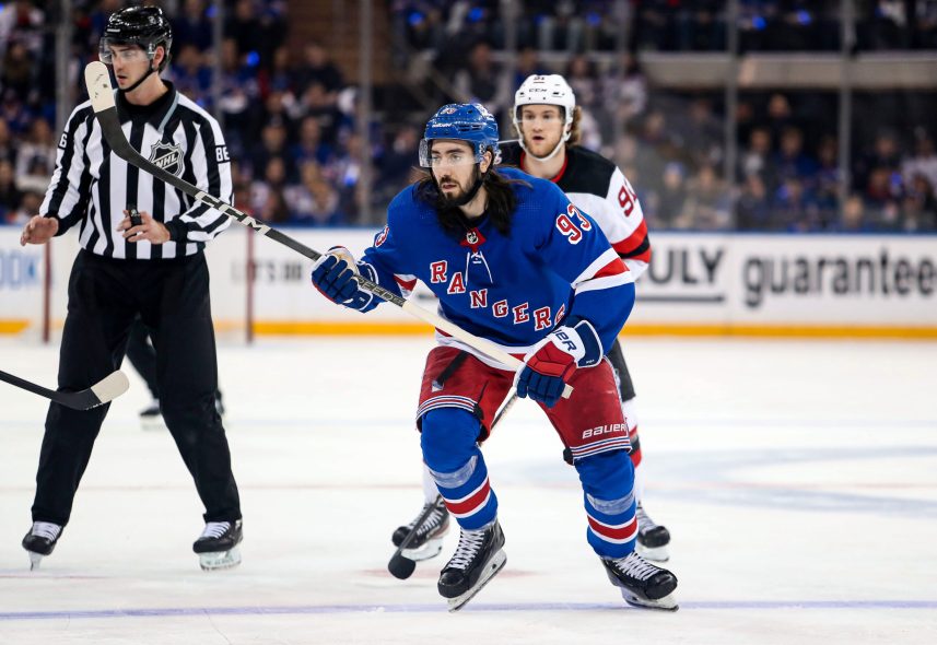 New York Rangers center Mika Zibanejad (93) skates after winning a face-off against New Jersey Devils center Dawson Mercer (91) during the third period in game six of the first round of the 2023 Stanley Cup Playoffs at Madison Square Garden