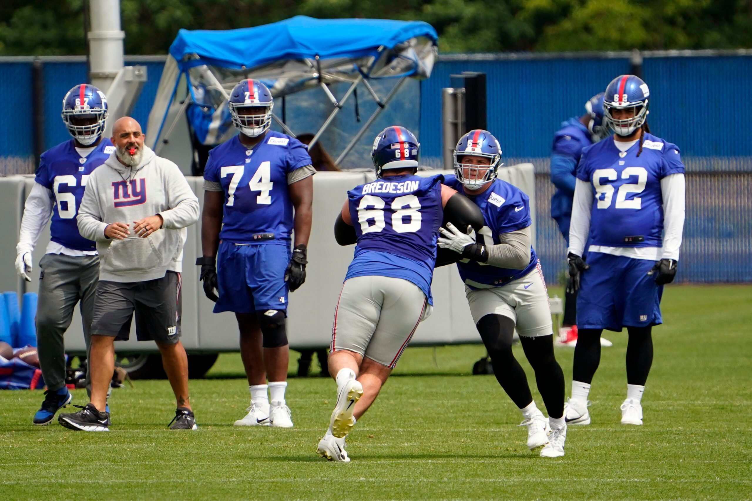 New York Giants guard Ben Bredeson (68), center J.C. Hassenauer (63) and the offensive line on day two of mandatory minicamp at the Giants training center on Wednesday, June 14, 2023, in East Rutherford.