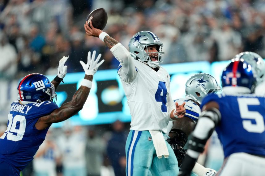 Dallas Cowboys quarterback Dak Prescott (4) throws a pass before New York Giants safety Xavier McKinney (29) can reach him