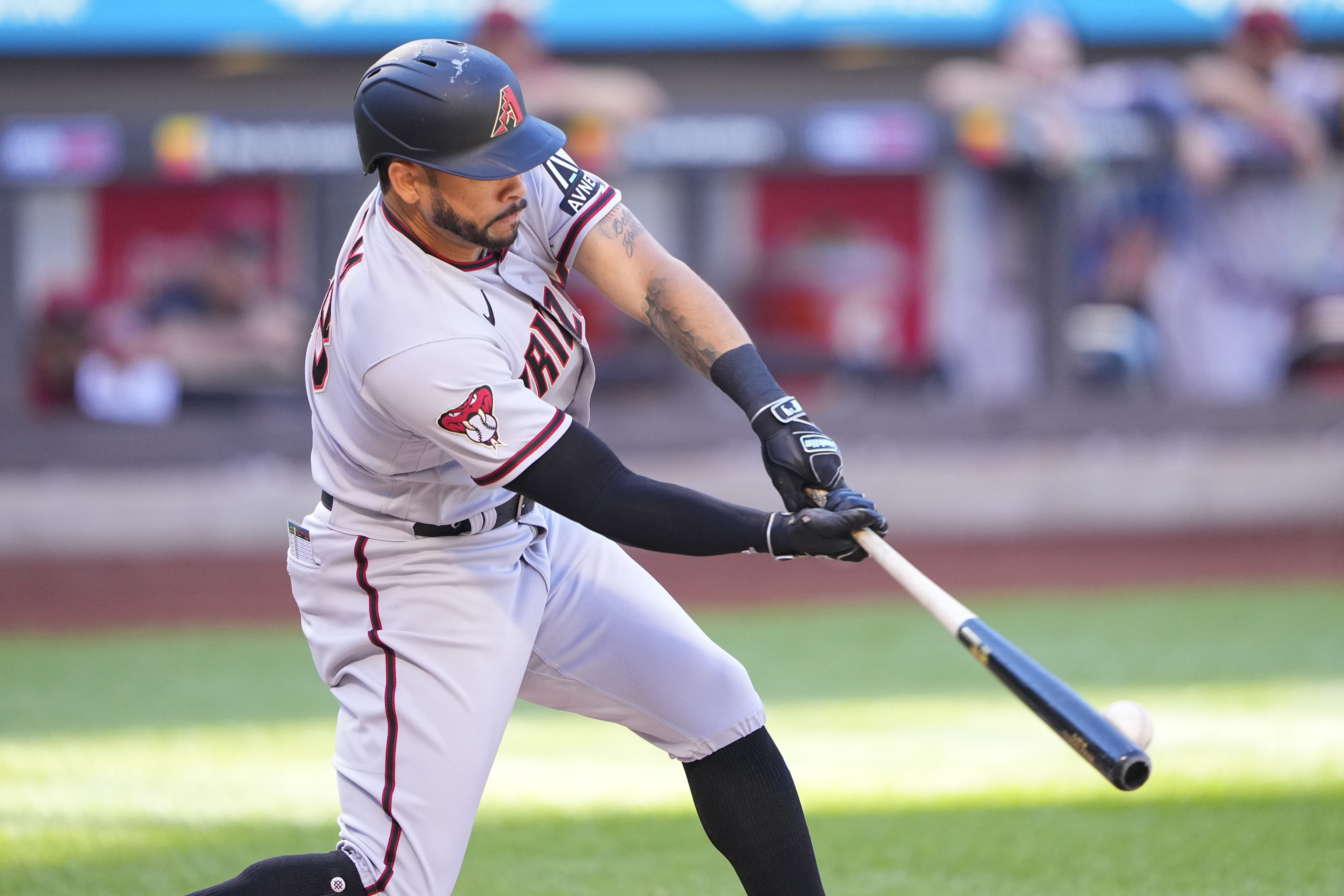 Arizona Diamondbacks left fielder Tommy Pham (28) hits a single agaimst the New York Mets during the first inning at Citi Field