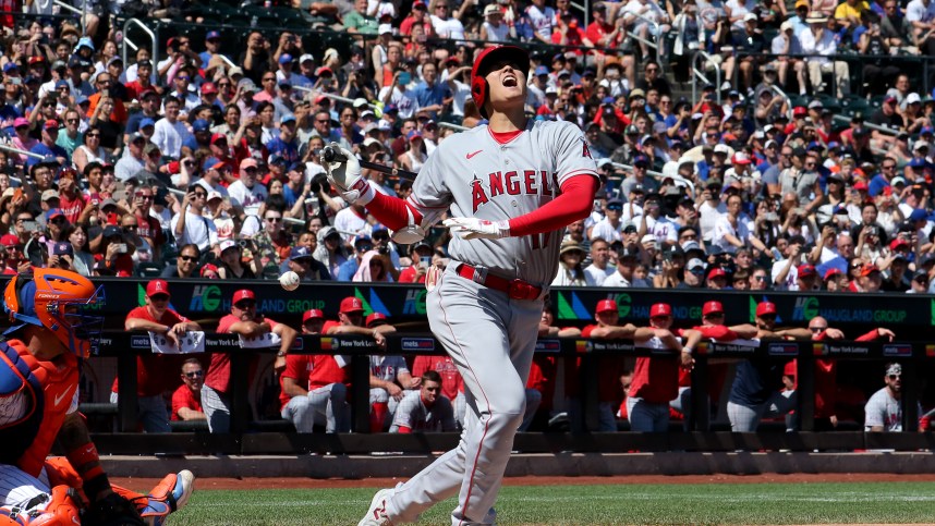 Los Angeles Angels designated hitter Shohei Ohtani (17) reacts after fouling a ball off his foot during the first inning against the New York Mets at Citi Field