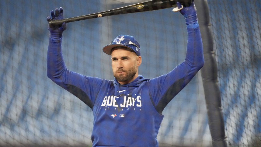 Toronto Blue Jays center fielder Kevin Kiermaier (39) stretches during batting practice before a game against the New York Yankees at Rogers Centre