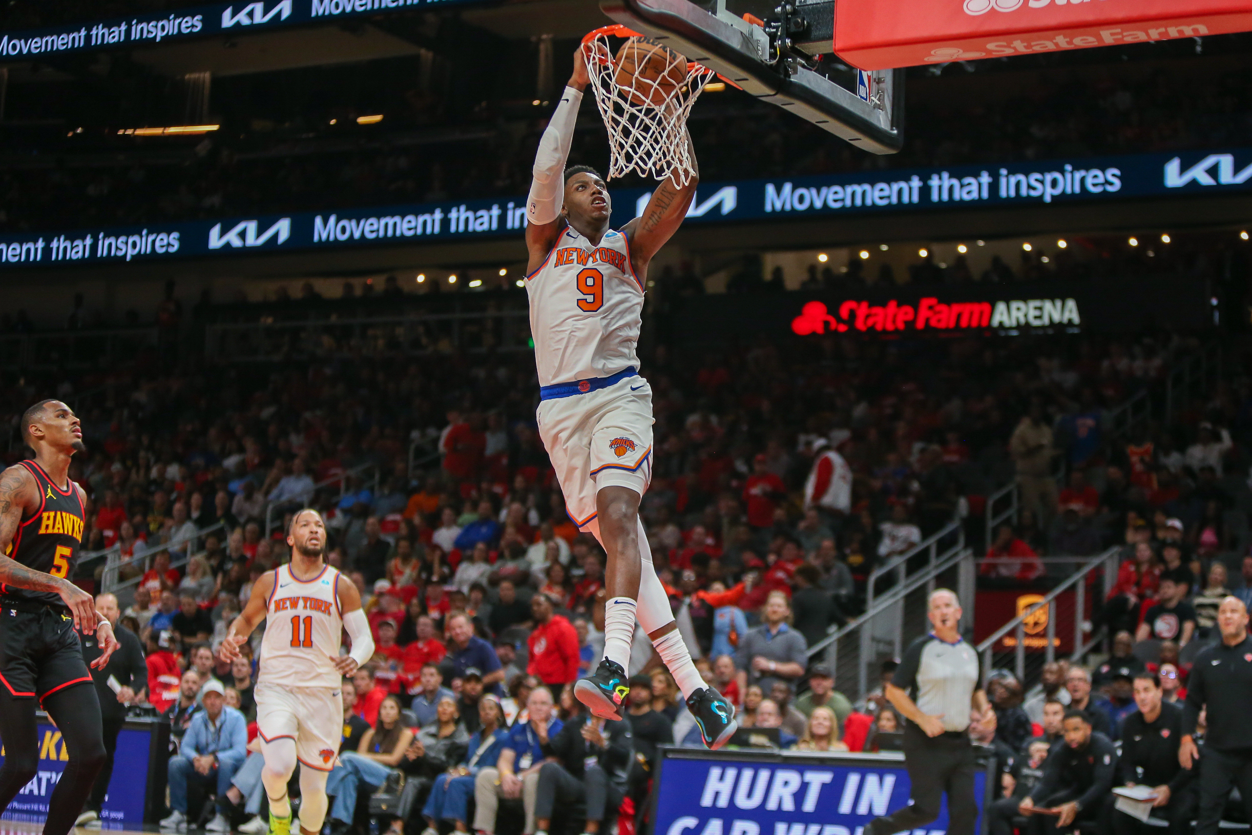 New York Knicks guard RJ Barrett (9) dunks against the Atlanta Hawks in the second quarter at State Farm Arena