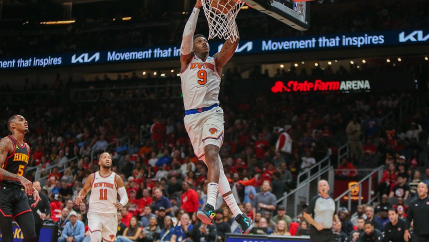 New York Knicks guard RJ Barrett (9) dunks against the Atlanta Hawks in the second quarter at State Farm Arena