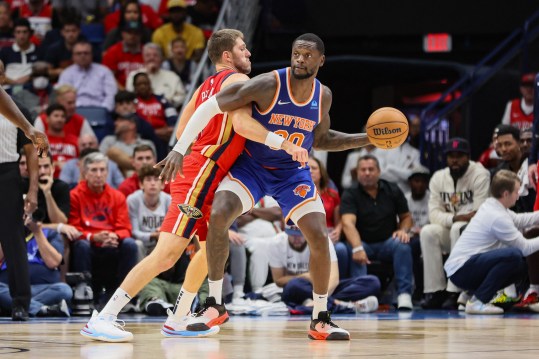 New York Knicks forward Julius Randle (30) is pressured by New Orleans Pelicans forward Matt Ryan (37) in the fourth quarter at Smoothie King Center