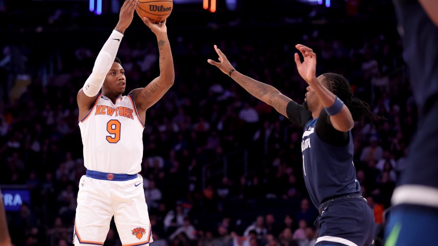 New York Knicks guard RJ Barrett (9) takes a shot against Minnesota Timberwolves center Naz Reid (11) during the third quarter at Madison Square Garden