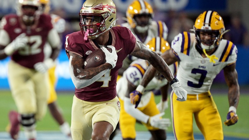Florida State Seminoles wide receiver Keon Coleman (4) runs the ball for a touchdown during the first half against the Louisiana State Tigers at Camping World Stadium (Giants prospect)