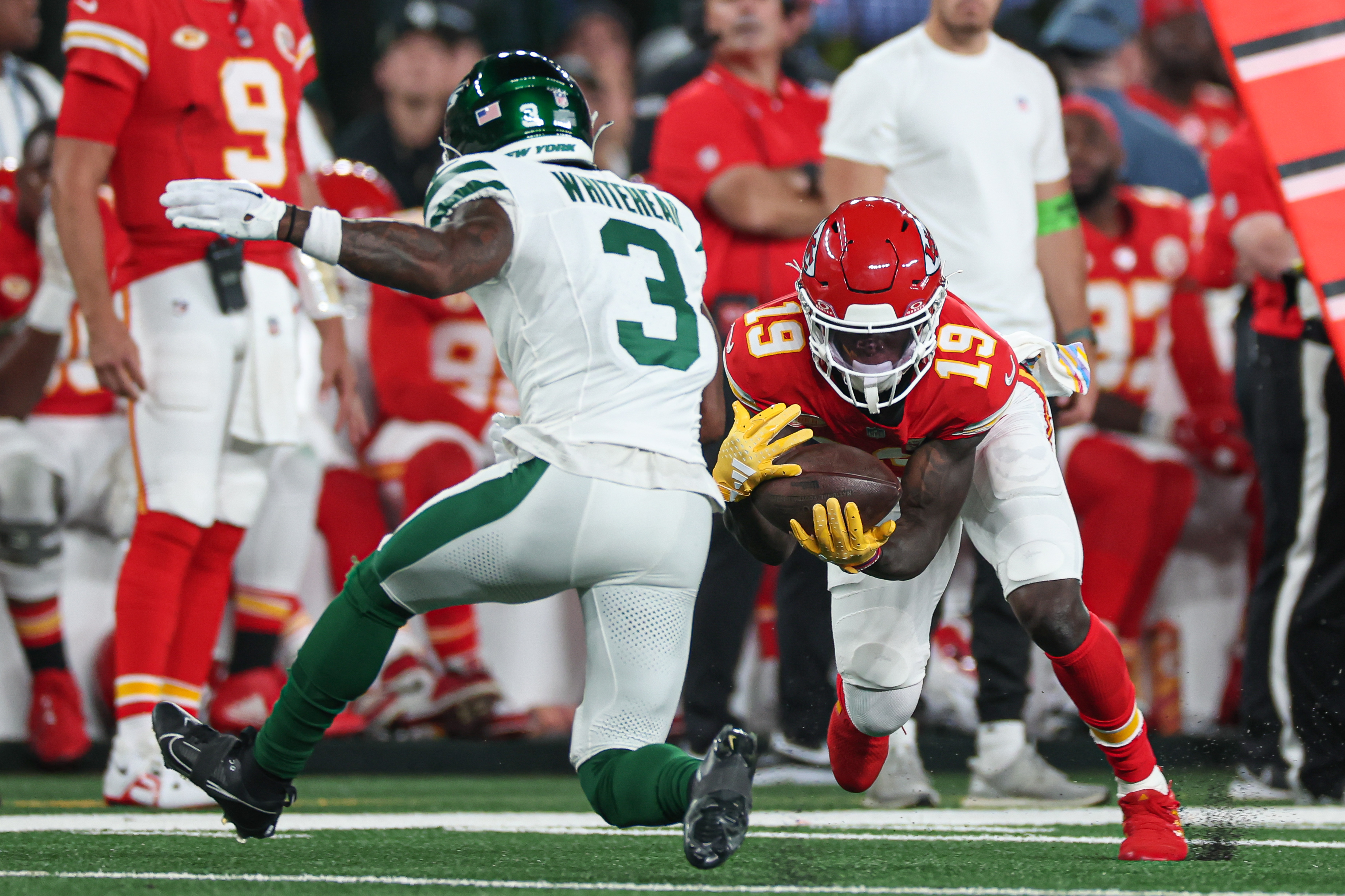 Kansas City Chiefs wide receiver Kadarius Toney (19) catches the ball as New York Jets safety Jordan Whitehead (3) defends during the first half at MetLife Stadium