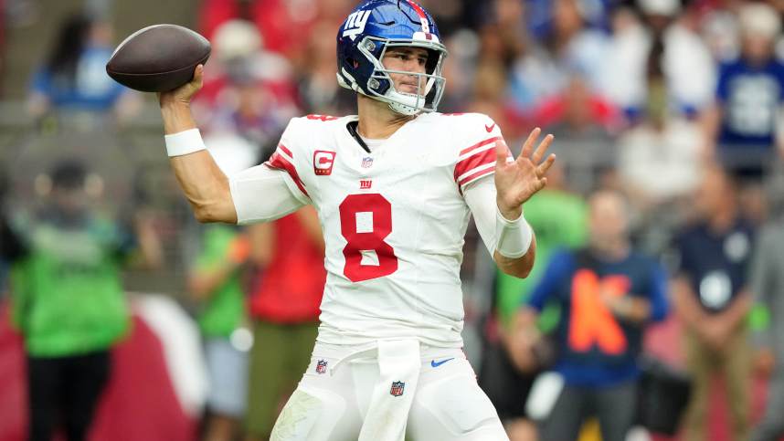 New York Giants quarterback Daniel Jones (8) passes against the Arizona Cardinals during the first half at State Farm Stadium.