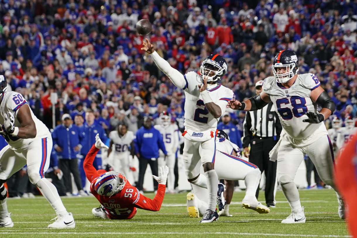 New York Giants quarterback Tyrod Taylor (2) throws the ball (Ben Bredeson) against the Buffalo Bills during the second half at Highmark Stadium