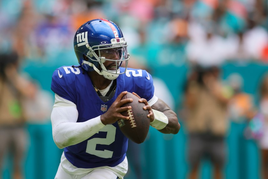 New York Giants quarterback Tyrod Taylor (2) runs with the football against the Miami Dolphins during the fourth quarter at Hard Rock Stadium
