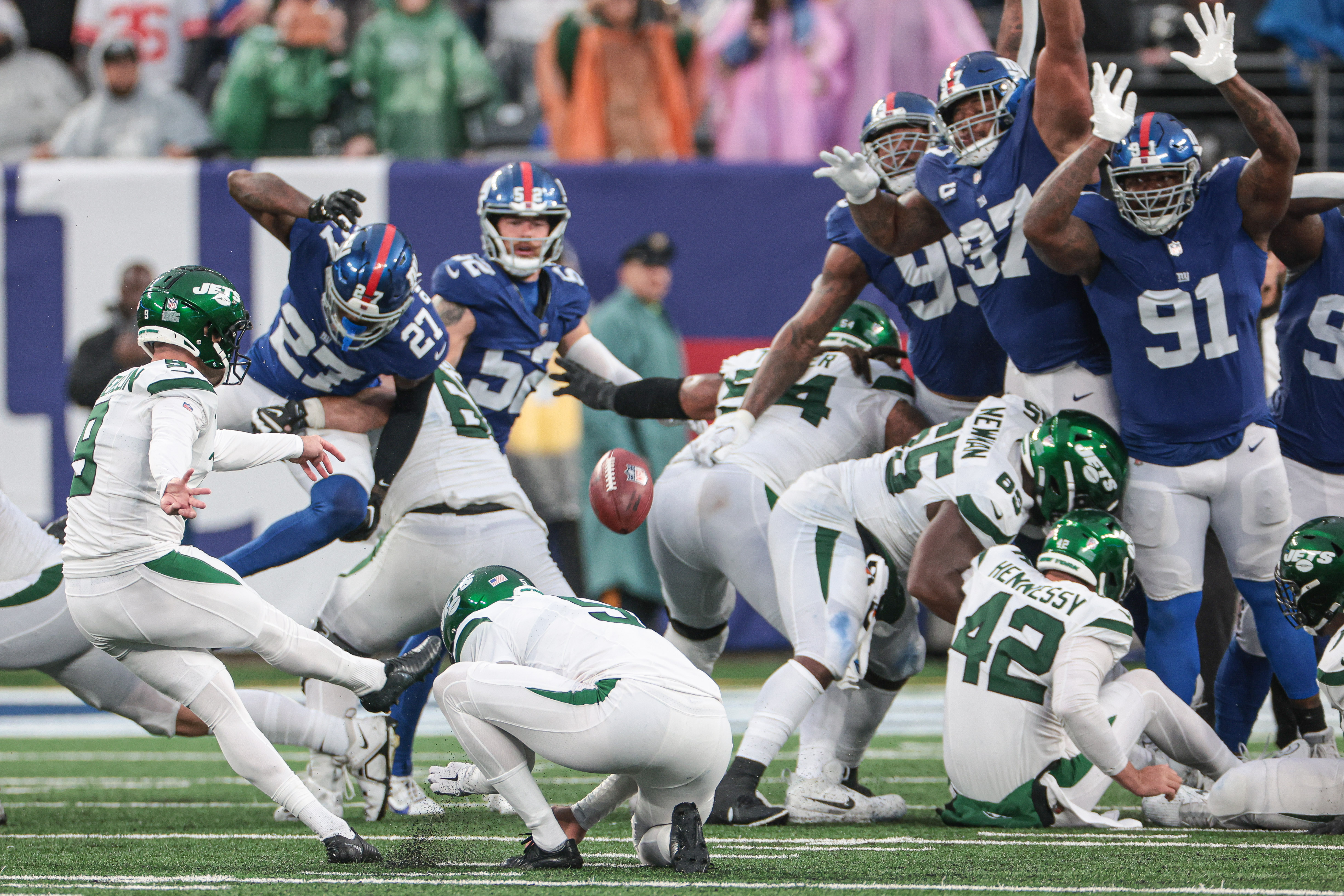 New York Jets place kicker Greg Zuerlein (9) kicks the game winning field goal in overtime against the New York Giants at MetLife Stadium