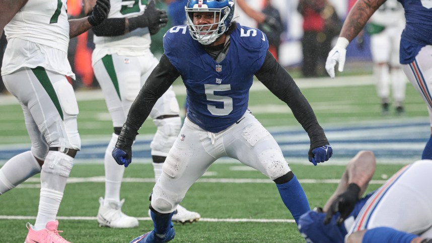 New York Giants linebacker Kayvon Thibodeaux (5) reacts after sacking New York Jets quarterback Zach Wilson (2) during the second half at MetLife Stadium