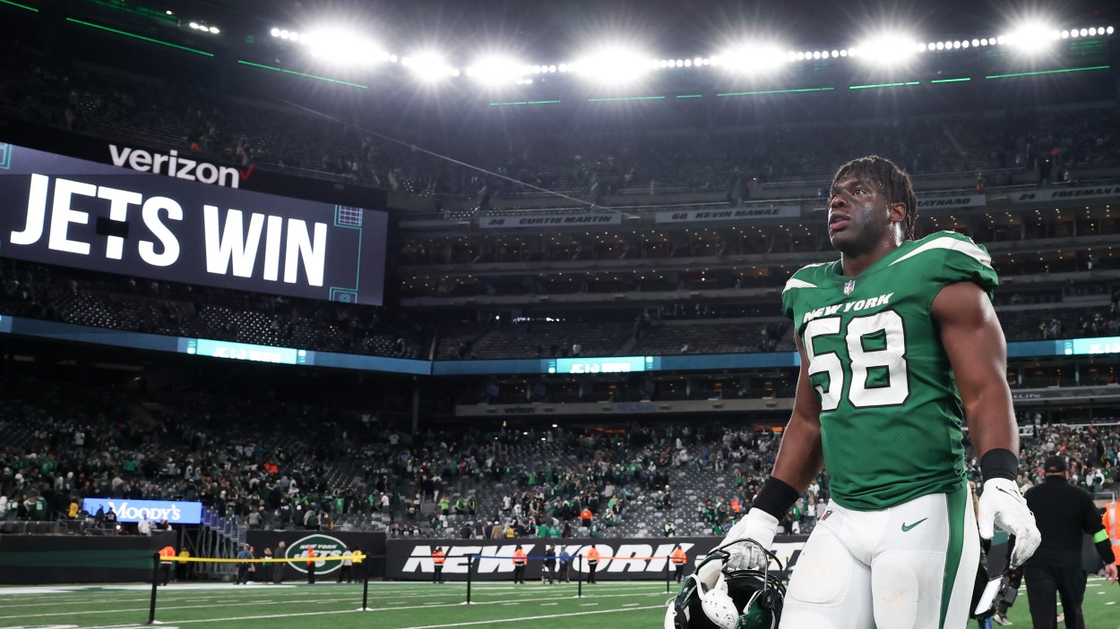 New York Jets defensive end Carl Lawson (58) on the field after defeating the Philadelphia Eagles at MetLife Stadium