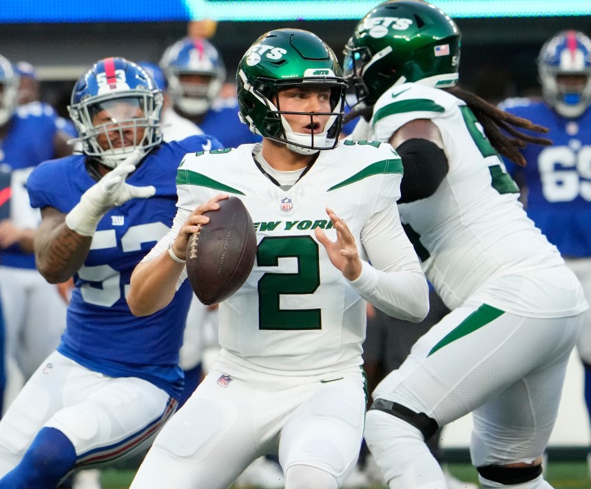 New York Jets quarterback Zach Wilson (2) throws in the first half against the Giants at MetLife Stadium