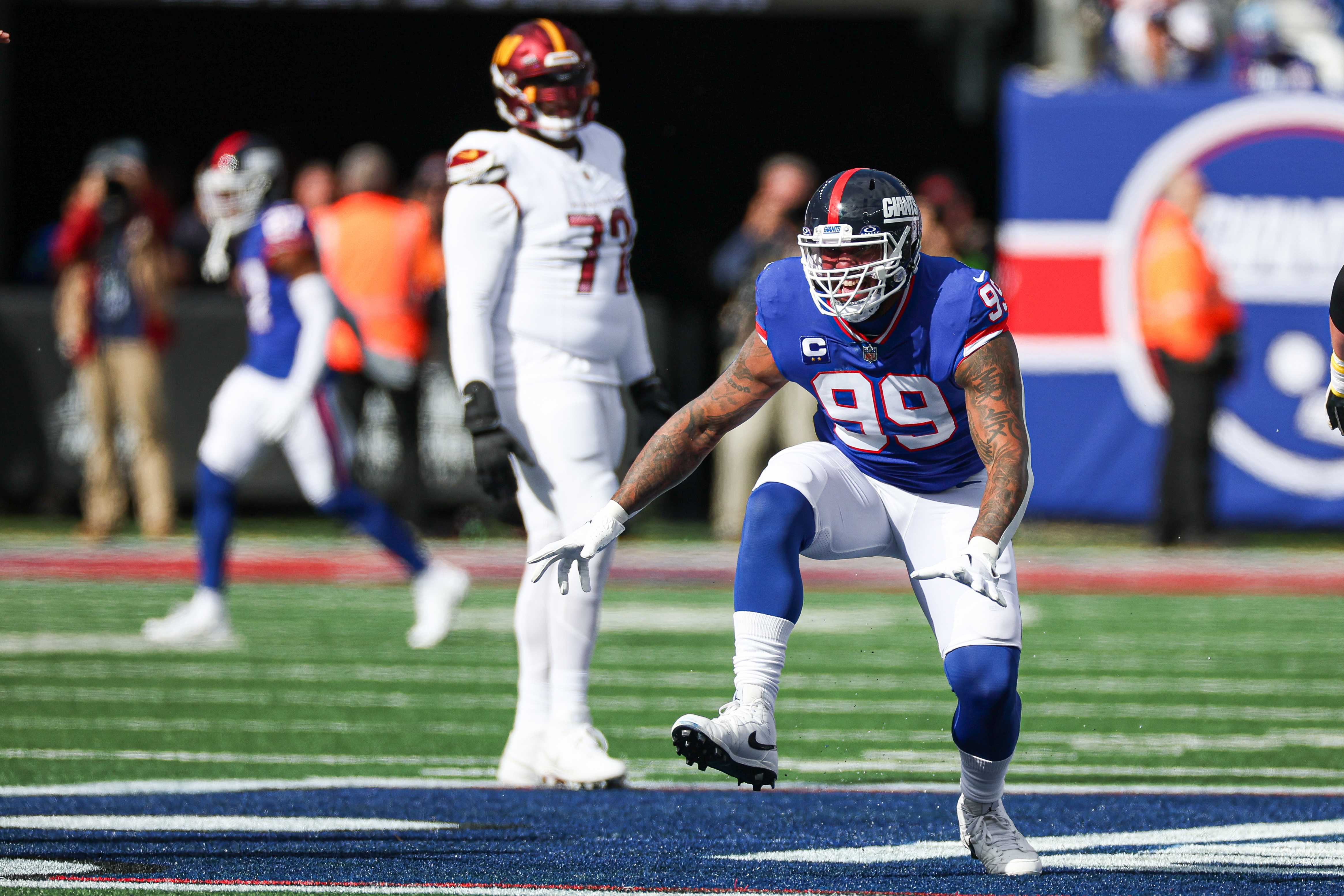 New York Giants defensive end Leonard Williams (99) celebrates a defensive stop during the first half against the Washington Commanders at MetLife Stadium